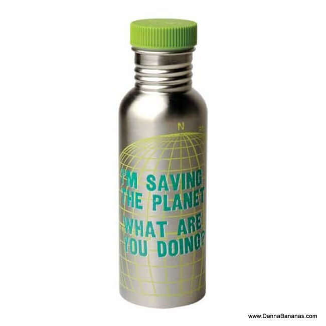 The "I'm Saving the Planet What Are You Doing Stainless Steel Water Bottle" by Blue Q features a stainless steel body with a green cap and showcases the text "I'M SAVING THE PLANET. WHAT ARE YOU DOING?" in bright green lettering. The bottle's background is adorned with a subtle globe design, highlighting its BPA-free and eco-friendly attributes.