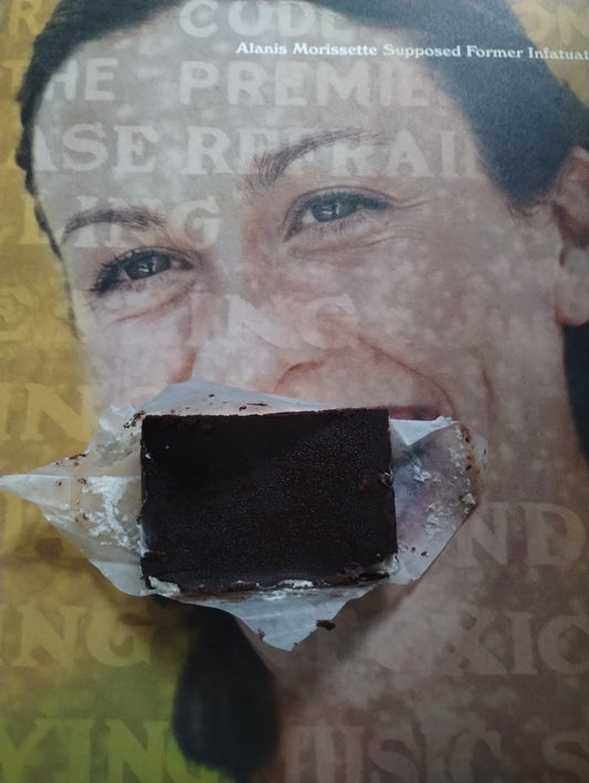 Alanis Morrissette eating a Nanaimo Bar on Canada Day