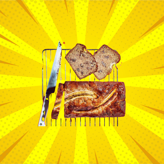 A loaf of banana bread, two slices of banana bread and a knife