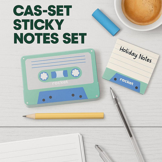 Cassette tape-shaped sticky notes set on a light wood desk, featuring a pastel-colored notepad, yellow pencil, and a coffee cup — retro office vibes.