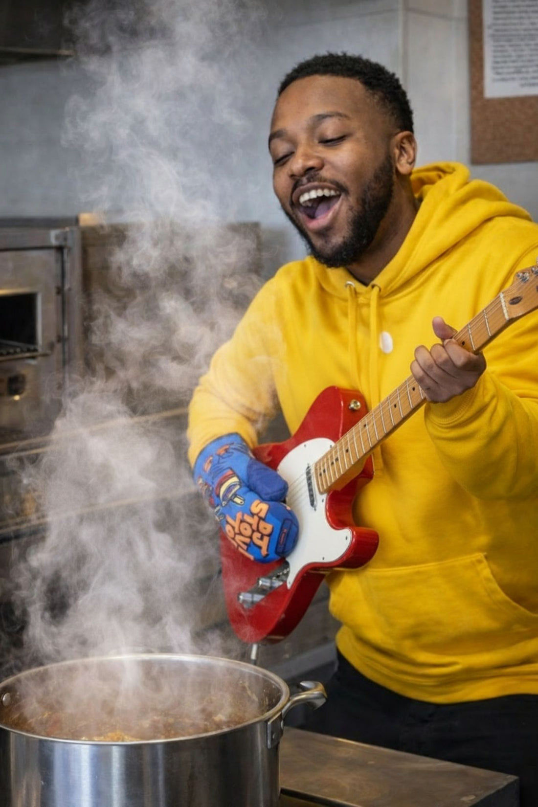 DJ Stovetop funny oven mitt holding a steaming pot while cooking and playing guitar, a novelty kitchen gift from a Canadian online gift store