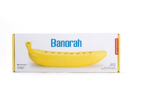 Image of a Banorah product box showing a yellow banana-shaped candle holder with the brand name and details visible.