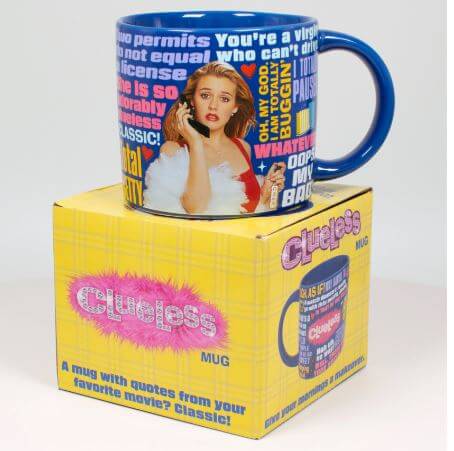 The Danna Bananas Clueless Mug features iconic "Clueless" quotes next to a surprised woman on a phone, packaged in a matching yellow box labeled "Clueless Mug," perfect for fans who love witty lines.