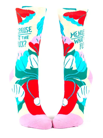 Colorful crew socks with "Menopause What The Fuck?" text, perfect for humor during menopause.