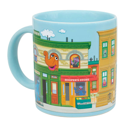 Sesame Street Sunny Days Heat Change Mug shown hot with Grover, Cookie Monster, the Count and Mr. Snuffleupagus.