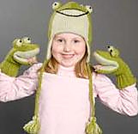 A child wearing a funny frog knit winter hat with ear flaps and dangling tassels, a playful cold-weather accessory with cheerful character.