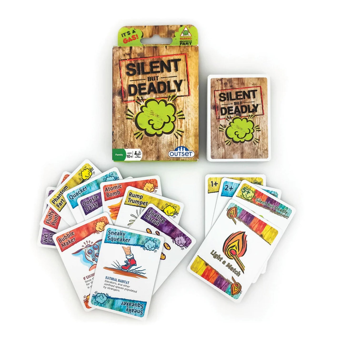Cards and box from the “Silent But Deadly” fart card game laid out, showing colourful illustrations and humorous card designs for party play.