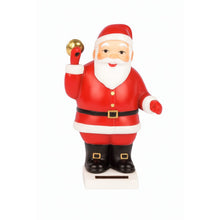Solar Santa figurine waving, holiday decoration.