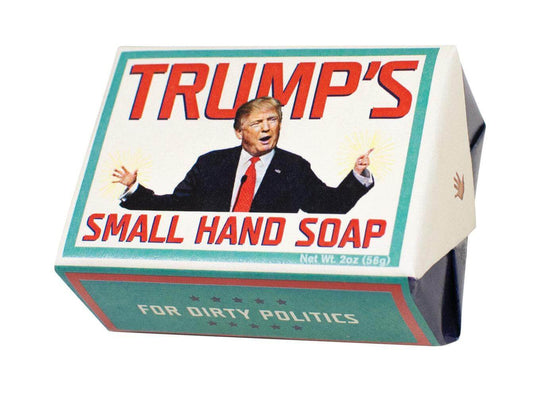 Danna Bananas' "Trump's Small Hand Soap" features a retro design with a suit-clad figure and the witty phrase "For Dirty Politics," all enhanced by a cucumber olive oil scent.