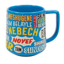 The Yiddish Insults Mug by Danna Bananas is a blue mug ideal for gifting, adorned with vibrant Yiddish words and phrases in different fonts and sizes. It humorously includes witty insults such as "Meshugene," "Kvetsch," "Shikse," and "Shnorer." The mug features a straightforward handle on the right side.