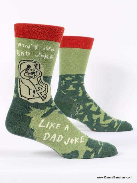 Ain't No Bad Joke Like A Dad Joke Men's Socks featuring a dad chilling in a chair with Ain't No Bad Joke Like A Dad Joke in text.
