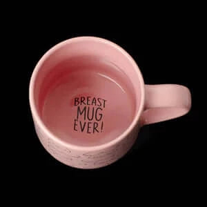 Looking at the bottom of a mug that reads, Breast Mug Ever.