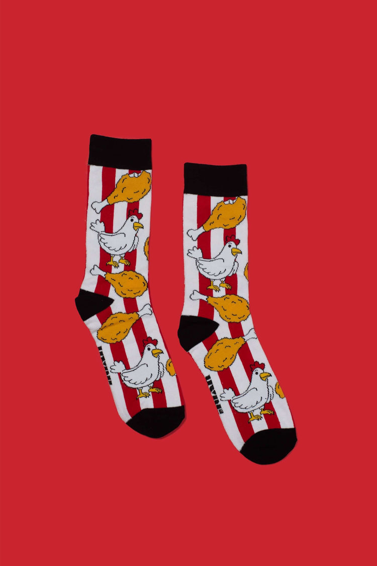 Socks with pictures of a chicken and chicken legs.