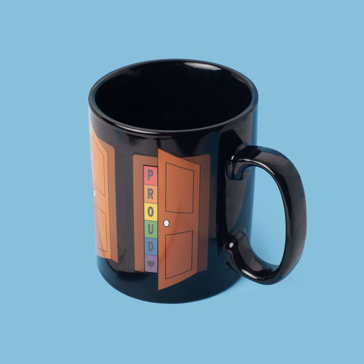 A mug showing a door open with a sign that reads Proud in rainbow colours