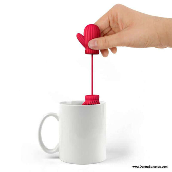 Tea infuser in the shape of red mittens