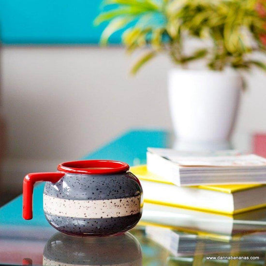 Curling Rock Mug on a Table Picture