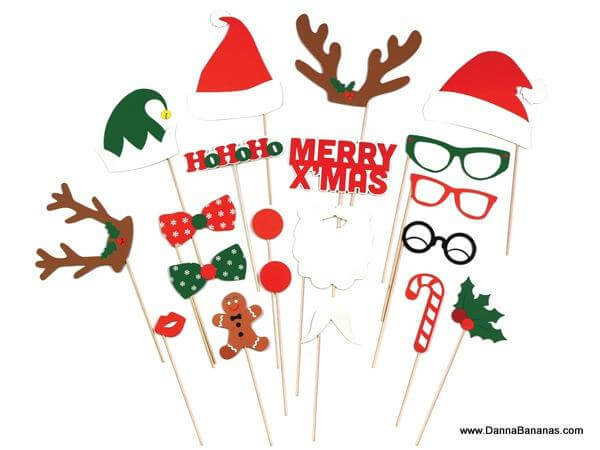 Introducing the Photo Booth XMas set by Danna Bananas—a festive collection of Christmas-themed props perfect for your holiday gathering! This set features Santa hats, antlers, glasses, a gingerbread man, candy canes, holly, and cheerful phrases like "Ho Ho Ho" and "Merry Xmas." It's ideal for adding fun to any Christmas party!