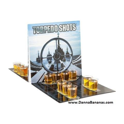 Torpedo Shots" by Danna Bananas is a party game with a naval theme, where shot glasses are arranged on a board similar to the Battleship game. The background features an image of a battleship wheel, while www.DannaBananas.com is printed at the bottom right corner.